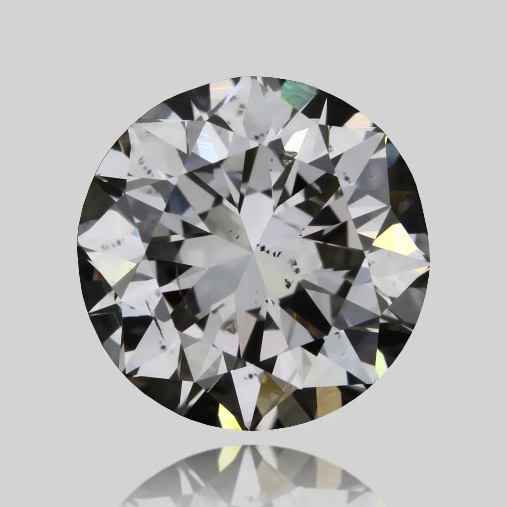 0.9 Carat Round M SI2 Natural Diamond 1 0.9 Carat Round M SI2 Natural Diamond