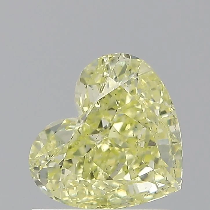 1.04 Carat Heart Fancy Yellow SI2 Natural Diamond 1 1.04 Carat Heart Fancy Yellow SI2 Natural Diamond