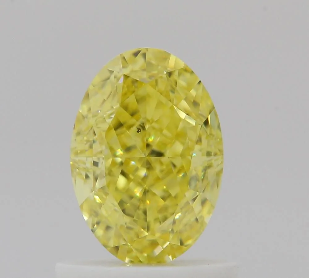 1.02 Carat Oval Fancy Intense Yellow VS2 Natural Diamond 1 1.02 Carat Oval Fancy Intense Yellow VS2 Natural Diamond