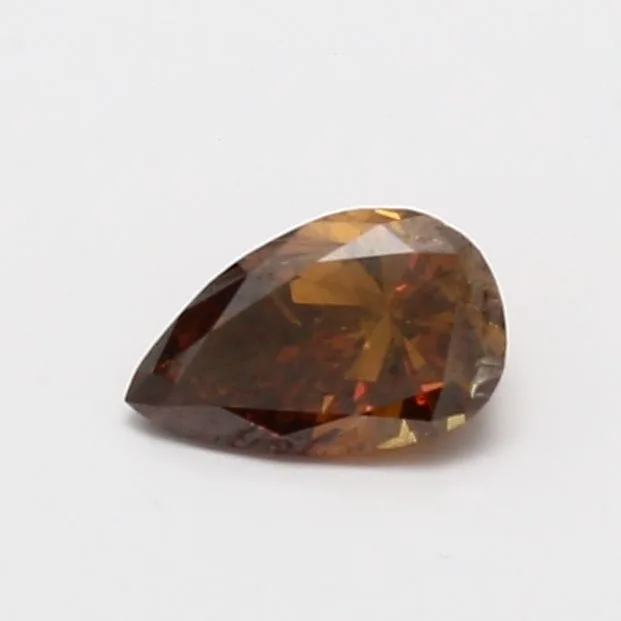 0.77 Carat Pear Fancy Deep Brown Orange I1 Natural Diamond