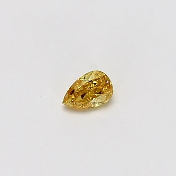 0.09 Carat Pear Fancy Vivid Yellow VS2 Natural Diamond