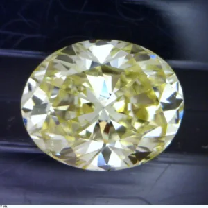 0.57 Carat Oval Fancy Yellow Natural Diamond