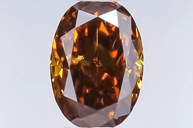 0.4 Carat Oval Fancy Dark Brown Natural Diamond 1 0.4 Carat Oval Fancy Dark Brown Natural Diamond