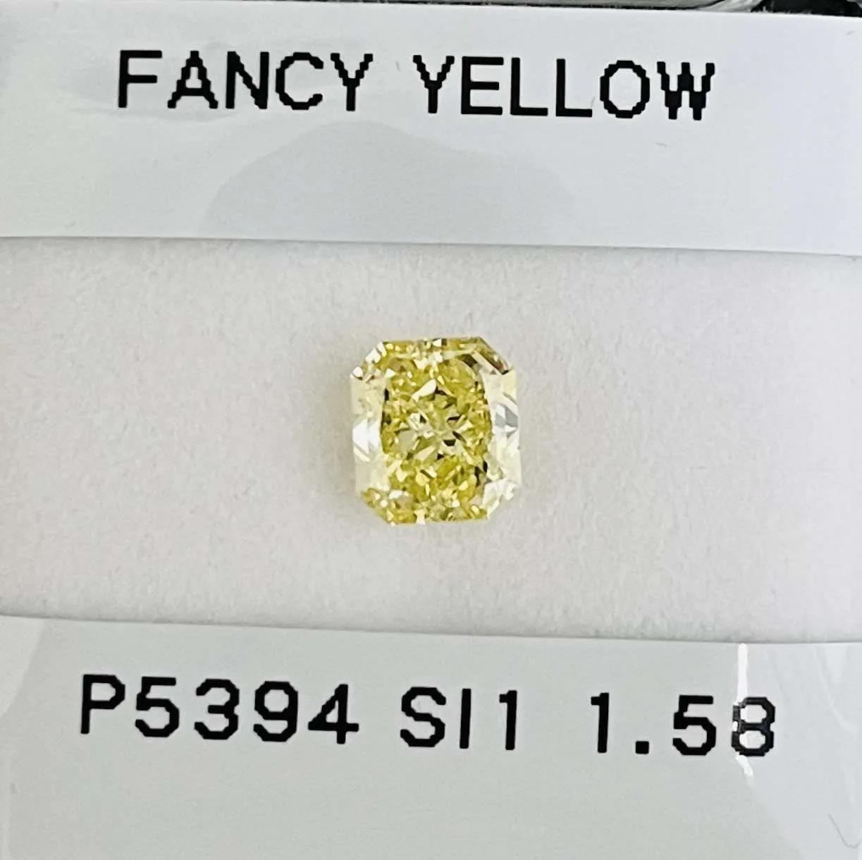1.58 Carat Radiant Fancy Yellow SI1 Natural Diamond