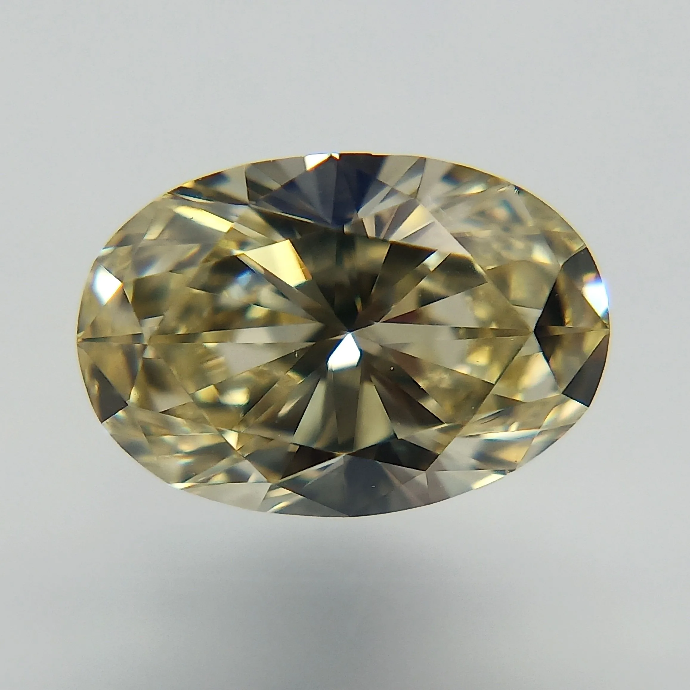 0.77 Carat Oval Fancy Light Yellow VS1 Natural Diamond