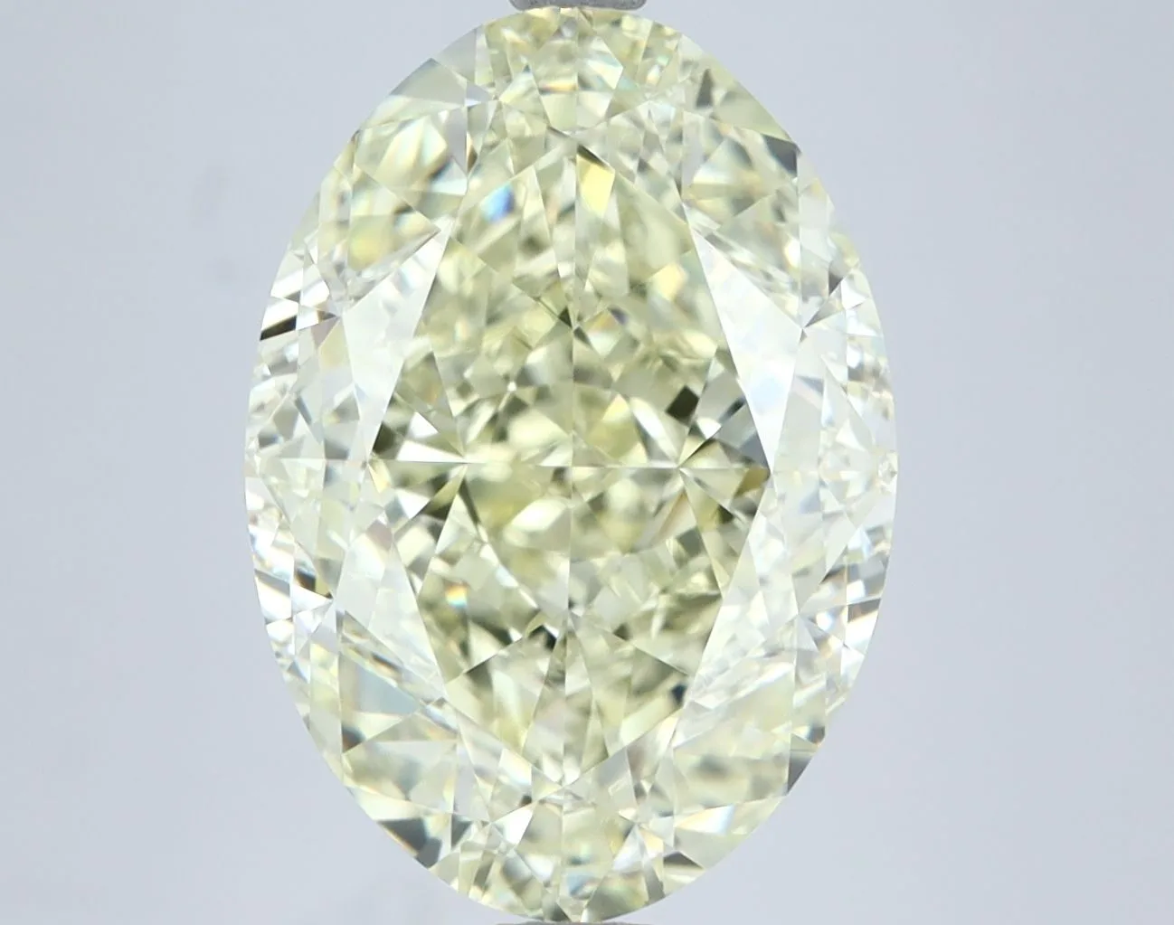 7.22 Carat Oval Fancy Light Yellow VVS1 Natural Diamond 1 7.22 Carat Oval Fancy Light Yellow VVS1 Natural Diamond