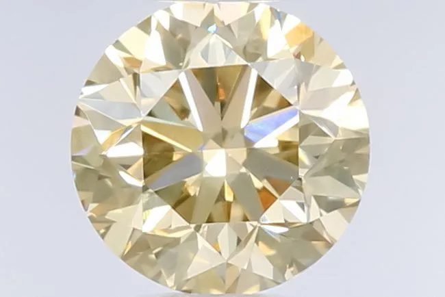 0.6 Carat Round Fancy Yellow SI1 Natural Diamond 1 0.6 Carat Round Fancy Yellow SI1 Natural Diamond