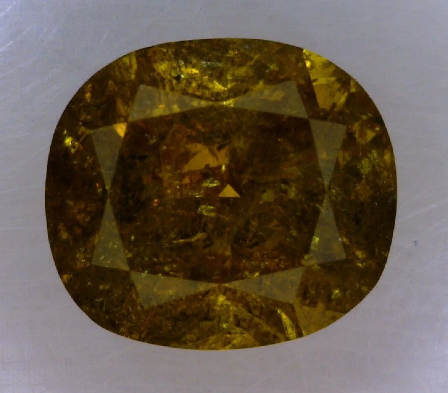 0.71 Carat Cushion Modified Fancy Deep Yellow Natural Diamond 1 0.71 Carat Cushion Modified Fancy Deep Yellow Natural Diamond