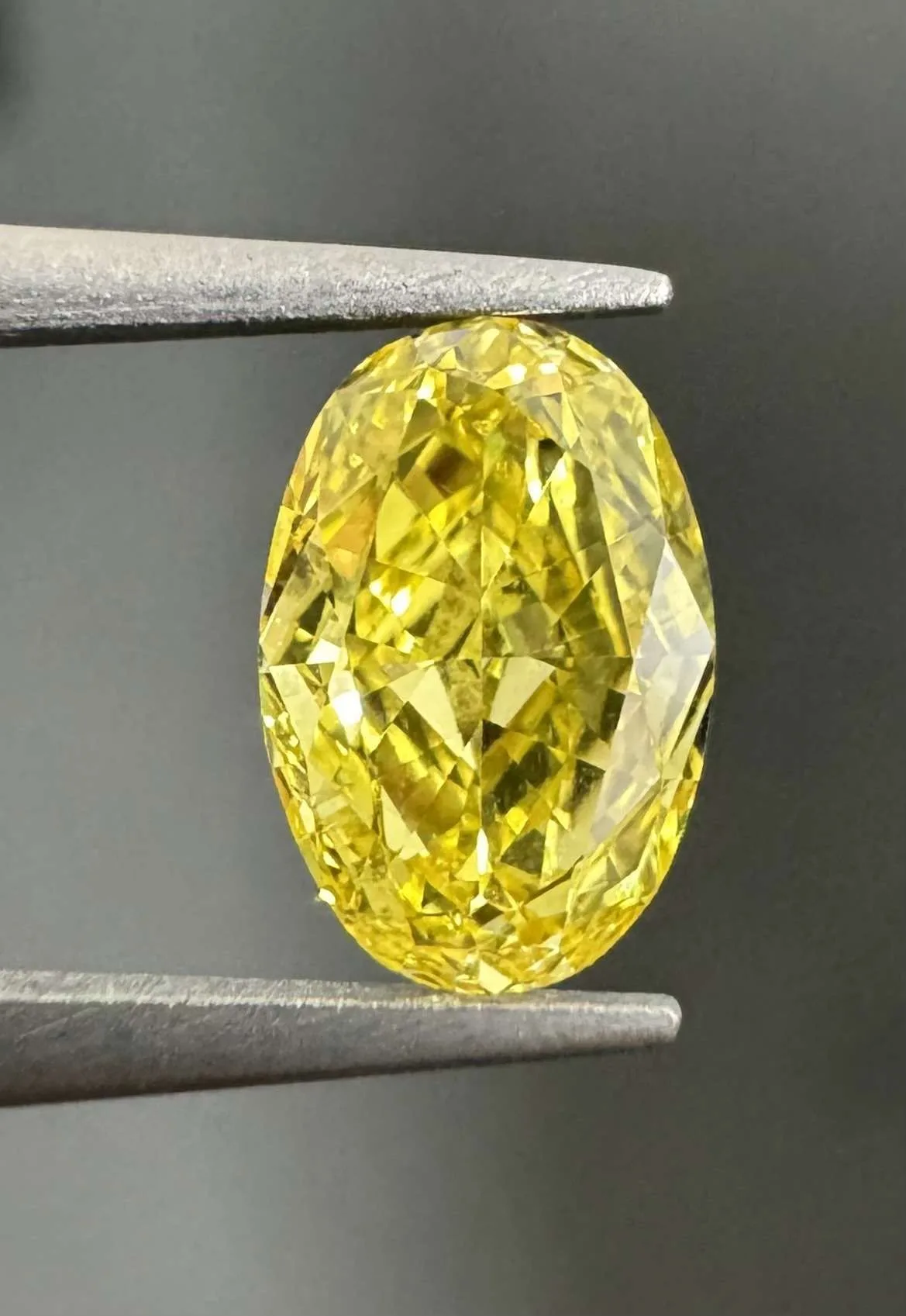 0.47 Carat Oval Fancy Vivid Yellow VS2 Natural Diamond 1 0.47 Carat Oval Fancy Vivid Yellow VS2 Natural Diamond