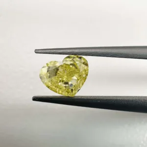 0.69 Carat Heart Fancy Yellow VS2 Natural Diamond
