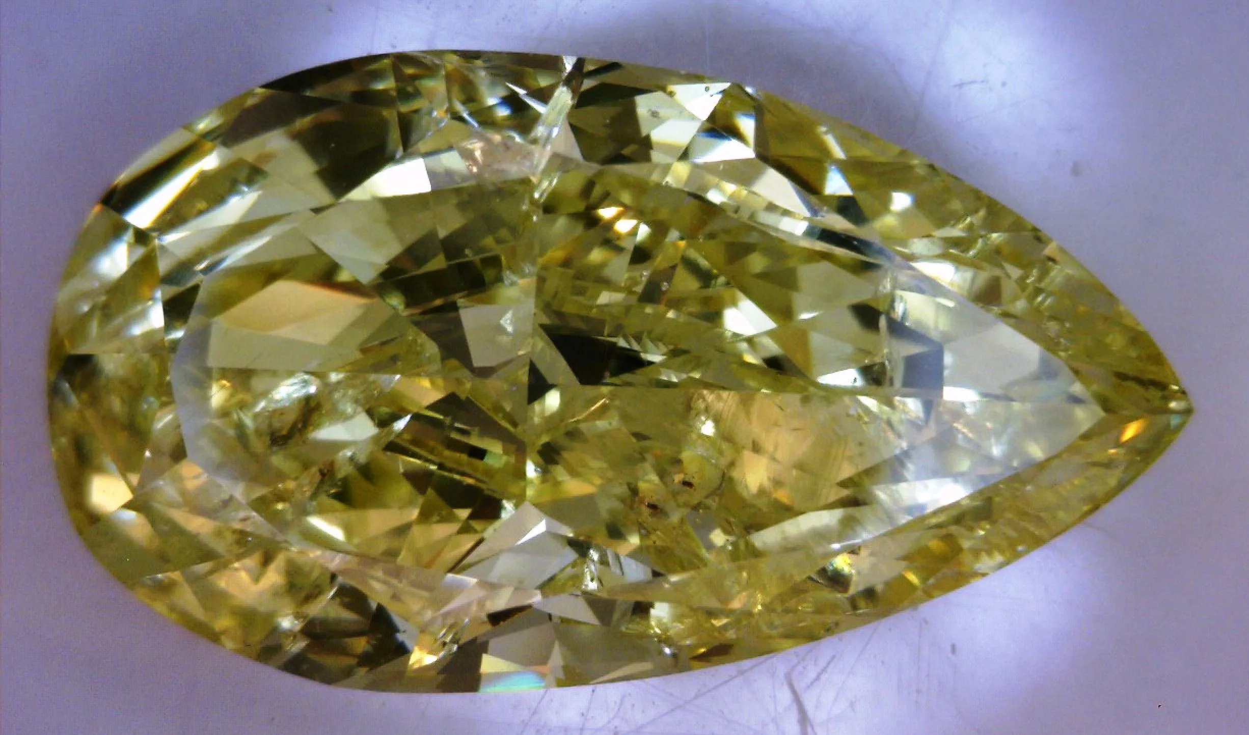 4.08 Carat Pear Fancy Intense Yellow Natural Diamond 1 4.08 Carat Pear Fancy Intense Yellow Natural Diamond