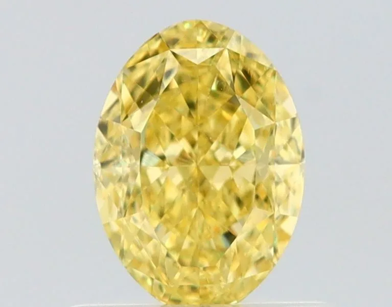 0.66 Carat Oval Fancy Intense Yellow VVS1 Natural Diamond 1 0.66 Carat Oval Fancy Intense Yellow VVS1 Natural Diamond