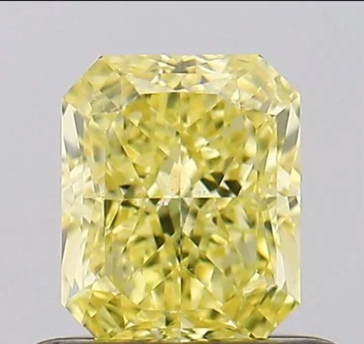 0.7 Carat Radiant Fancy Intense Yellow SI1 Natural Diamond 1 0.7 Carat Radiant Fancy Intense Yellow SI1 Natural Diamond