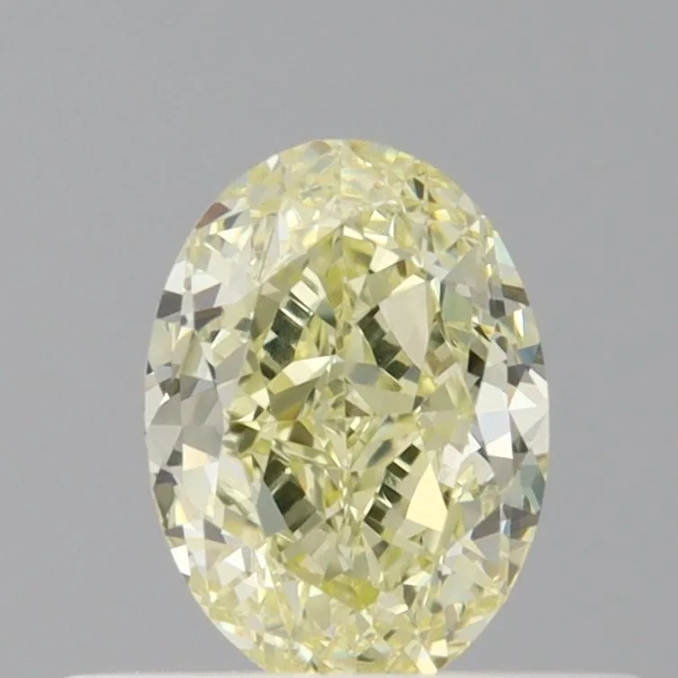0.52 Carat Oval Fancy Light Yellow VS1 Natural Diamond