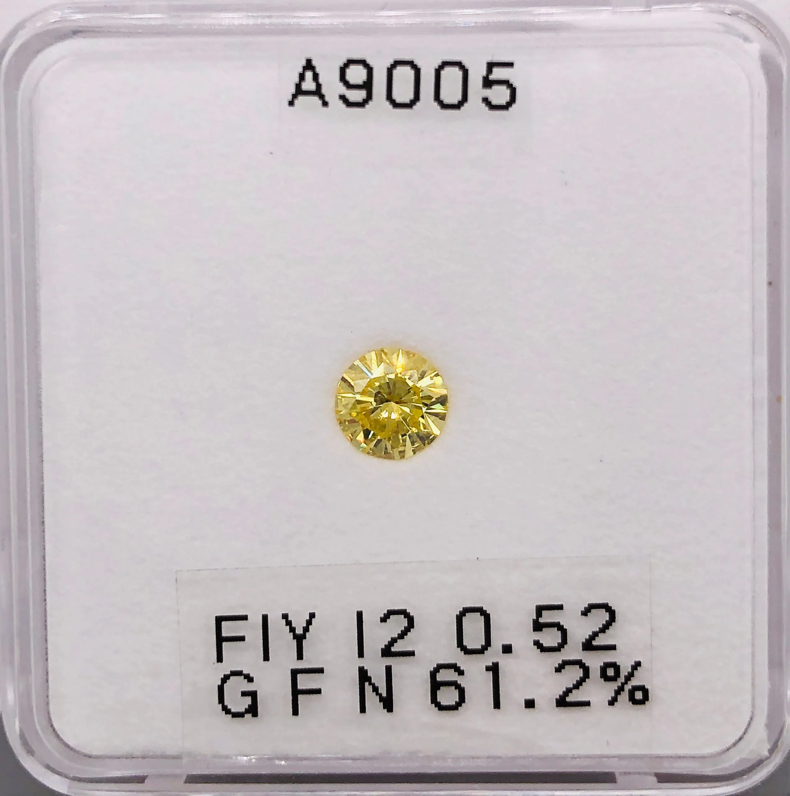 0.52 Carat Round Fancy Intense Yellow I2 Natural Diamond 1 0.52 Carat Round Fancy Intense Yellow I2 Natural Diamond