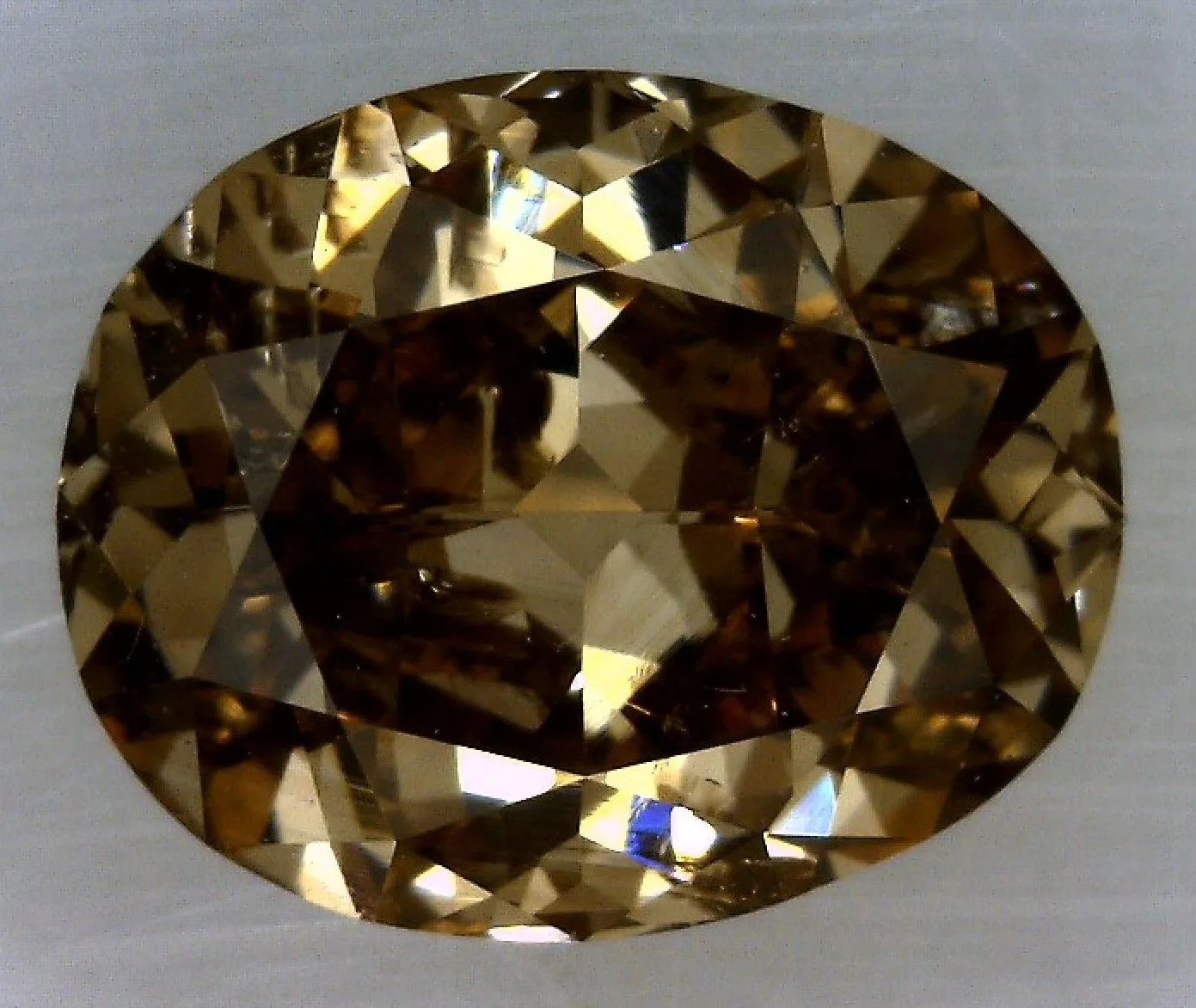 0.71 Carat Oval Fancy Dark Brown Natural Diamond 1 0.71 Carat Oval Fancy Dark Brown Natural Diamond