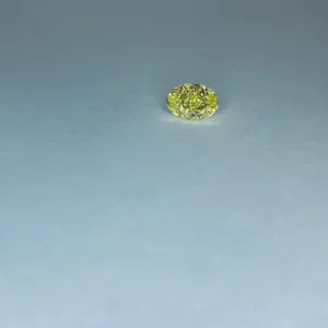 0.69 Carat Oval Fancy Intense Yellow VS2 Natural Diamond