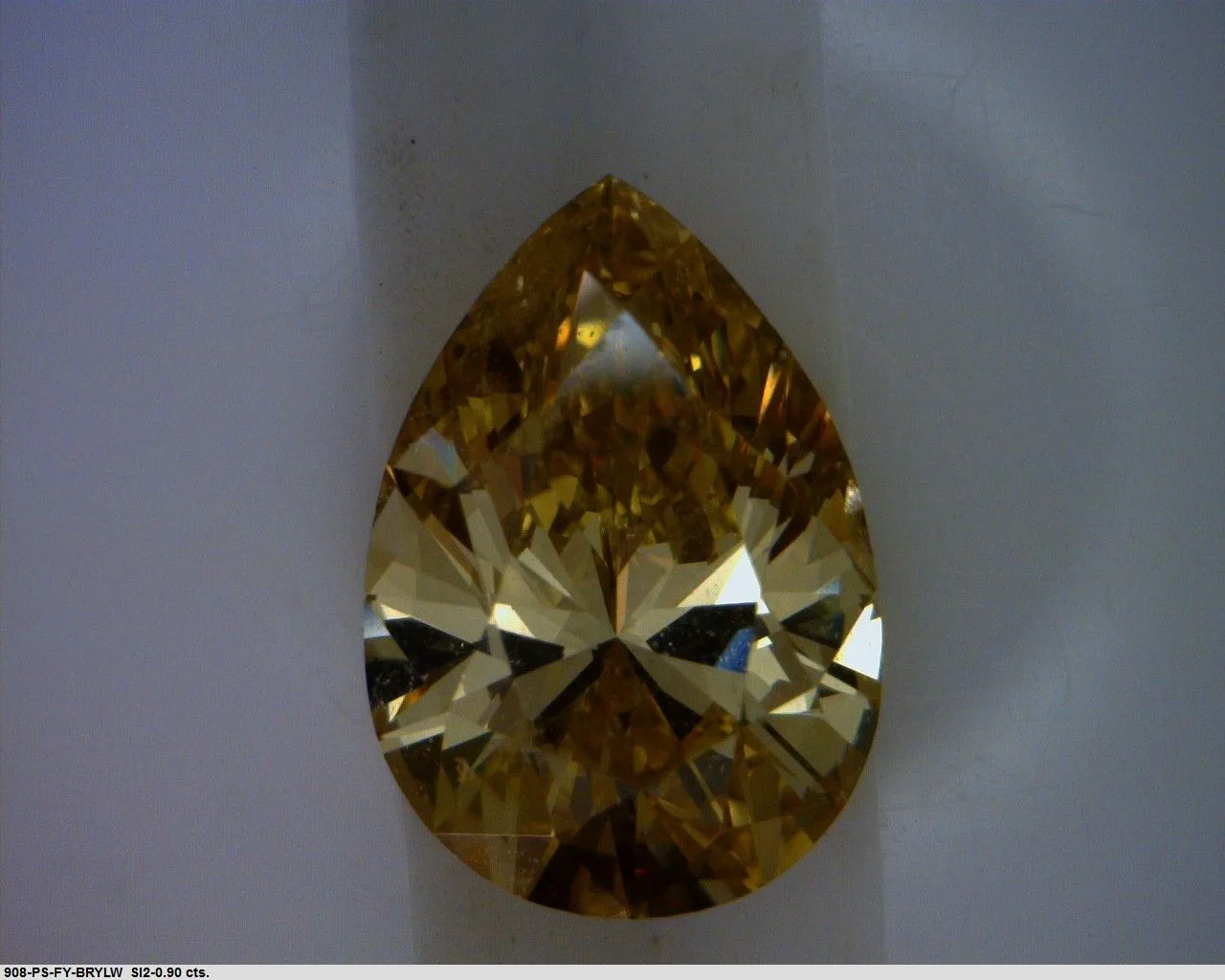 0.9 Carat Pear Fancy Brown Yellow SI2 Natural Diamond 1 0.9 Carat Pear Fancy Brown Yellow SI2 Natural Diamond