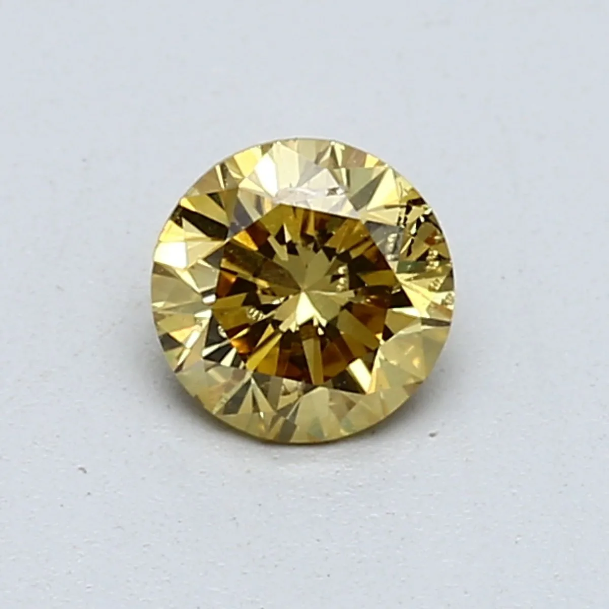 0.61 Carat Round Fancy Vivid Yellow Natural Diamond