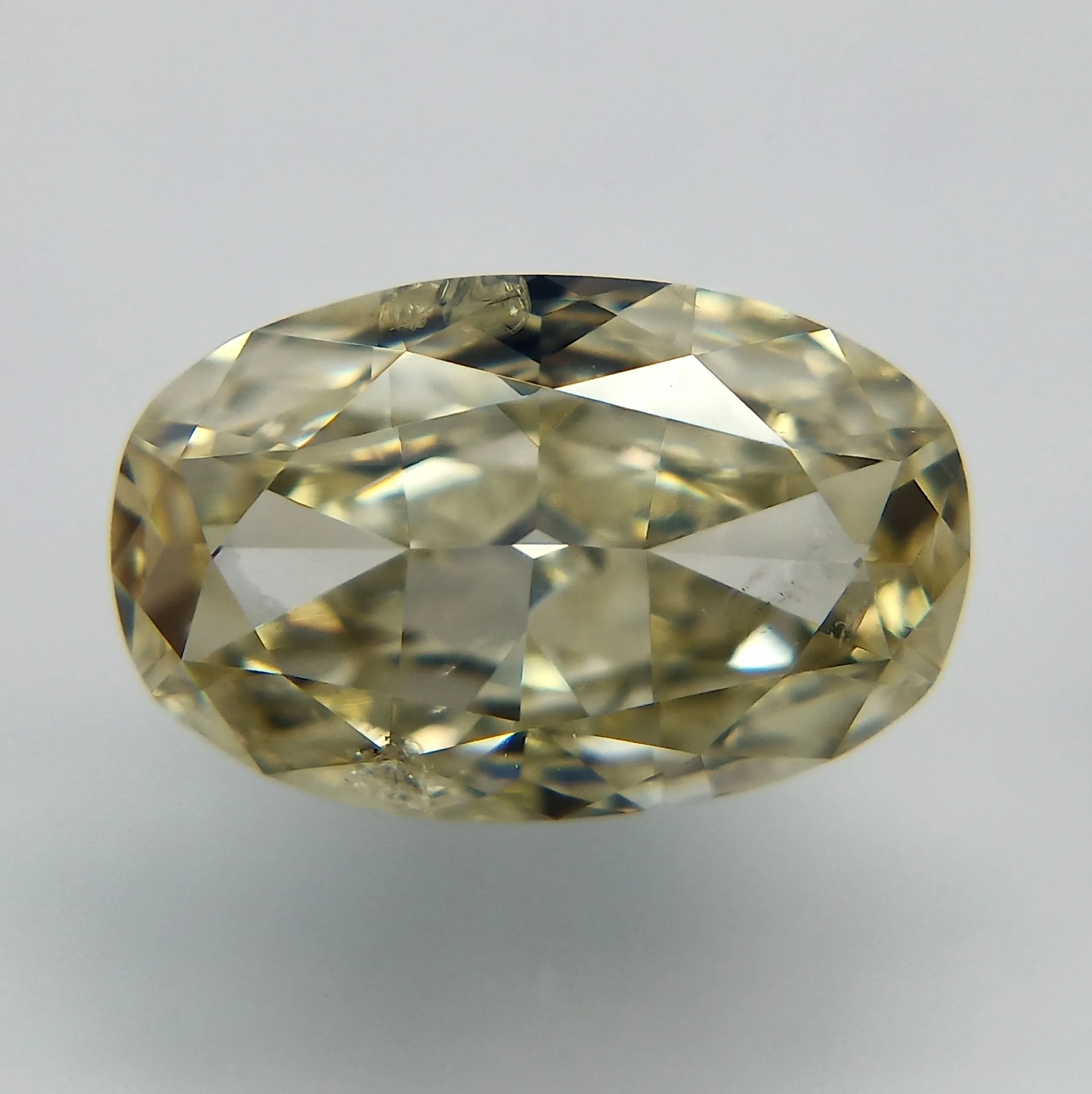 1.26 Carat Oval Fancy Light Yellow Natural Diamond
