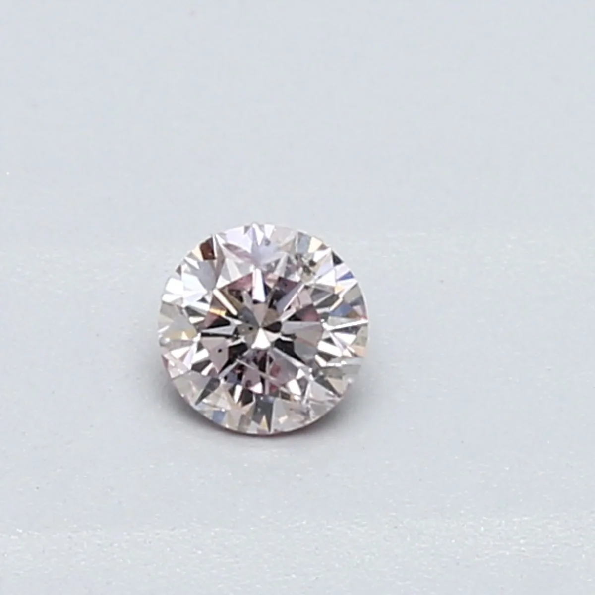 0.23 Carat Round Very Light Pink I2 Natural Diamond