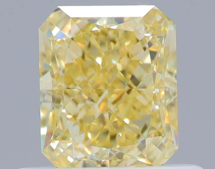 0.63 Carat Radiant Fancy Yellow VS1 Natural Diamond 1 0.63 Carat Radiant Fancy Yellow VS1 Natural Diamond