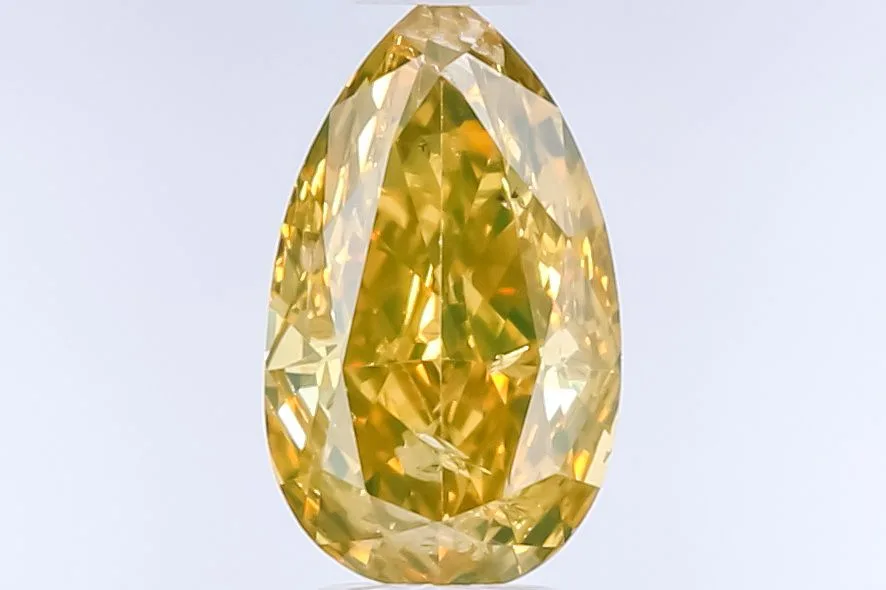0.54 Carat Pear Fancy Deep Yellow Natural Diamond 1 0.54 Carat Pear Fancy Deep Yellow Natural Diamond