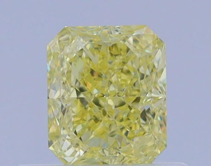 0.52 Carat Radiant Fancy Yellow VVS2 Natural Diamond 1 0.52 Carat Radiant Fancy Yellow VVS2 Natural Diamond