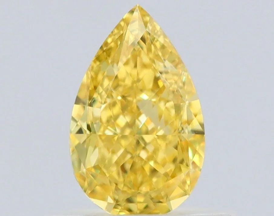 0.56 Carat Pear Fancy Vivid Yellow VS1 Natural Diamond 1 0.56 Carat Pear Fancy Vivid Yellow VS1 Natural Diamond