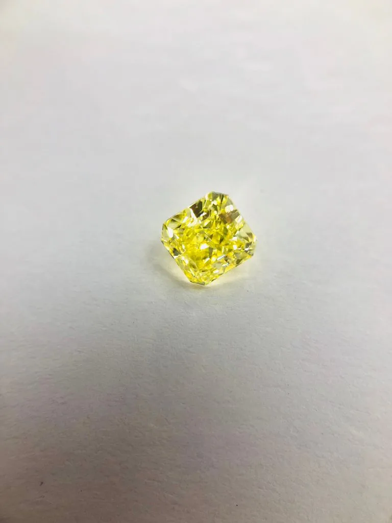 0.57 Carat Radiant Fancy Yellow VS2 Natural Diamond 1 0.57 Carat Radiant Fancy Yellow VS2 Natural Diamond