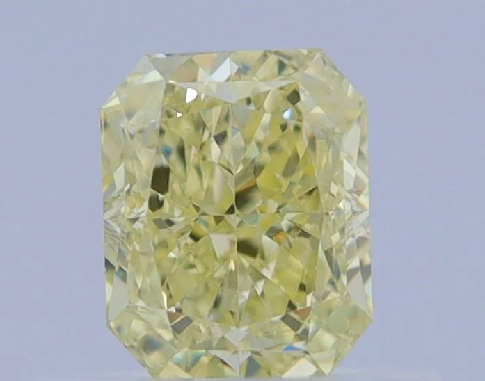 0.52 Carat Radiant Fancy Yellow VS2 Natural Diamond 1 0.52 Carat Radiant Fancy Yellow VS2 Natural Diamond