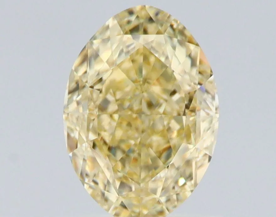1.17 Carat Oval Fancy Yellow VVS2 Natural Diamond 1 1.17 Carat Oval Fancy Yellow VVS2 Natural Diamond