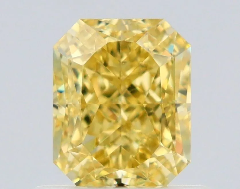 0.75 Carat Radiant Fancy Intense Yellow VVS1 Natural Diamond 1 0.75 Carat Radiant Fancy Intense Yellow VVS1 Natural Diamond