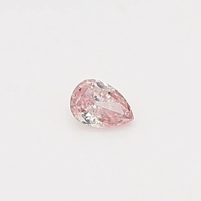 0.06 Carat Pear Fancy Intense Pink Natural Diamond