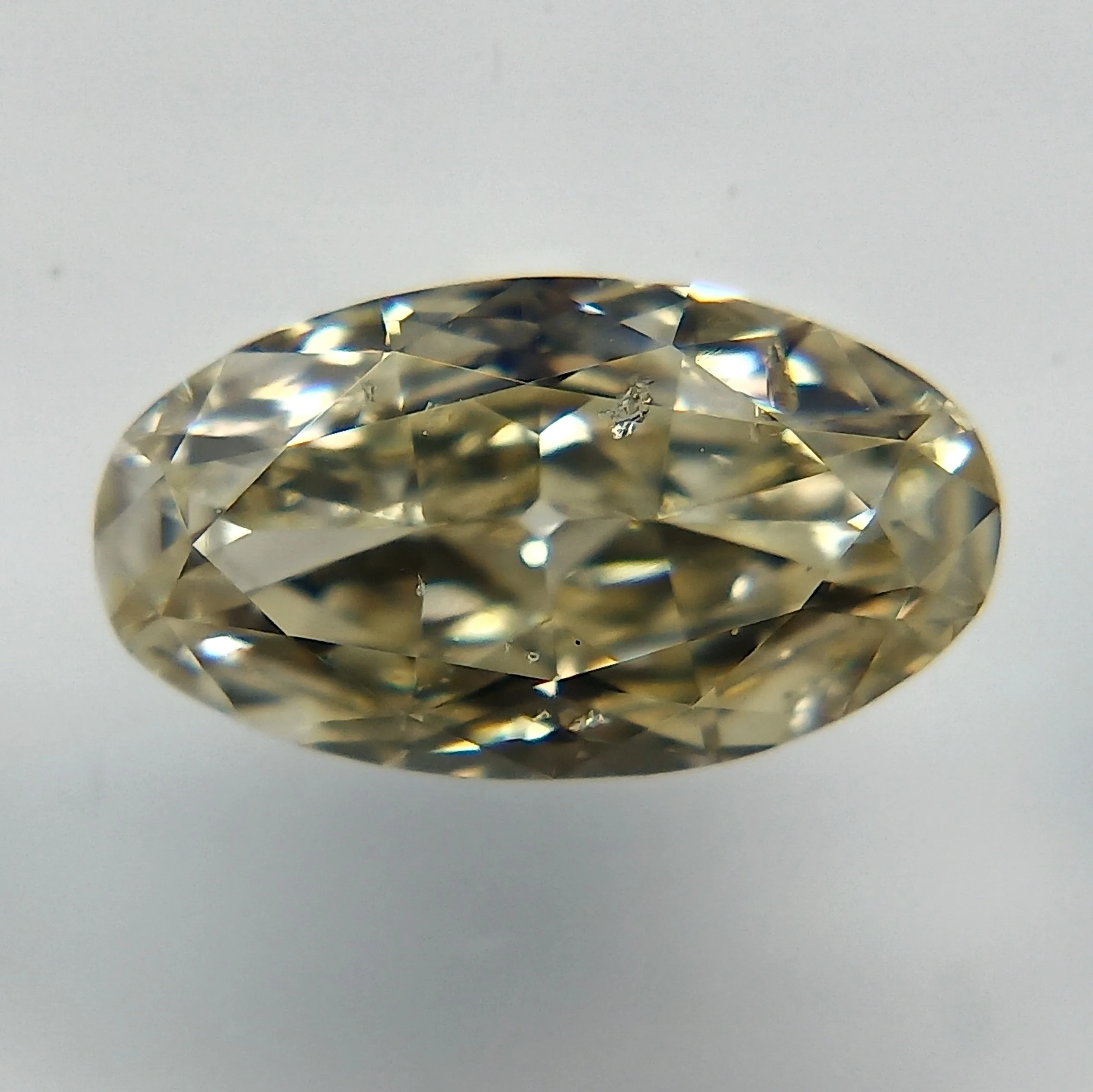 0.58 Carat Oval Fancy Light Yellow Natural Diamond