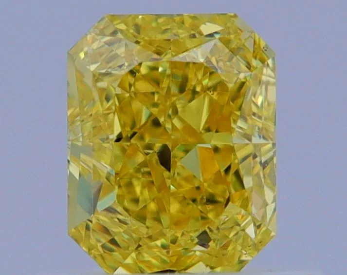 0.67 Carat Radiant Fancy Vivid Yellow VS1 Natural Diamond 1 0.67 Carat Radiant Fancy Vivid Yellow VS1 Natural Diamond