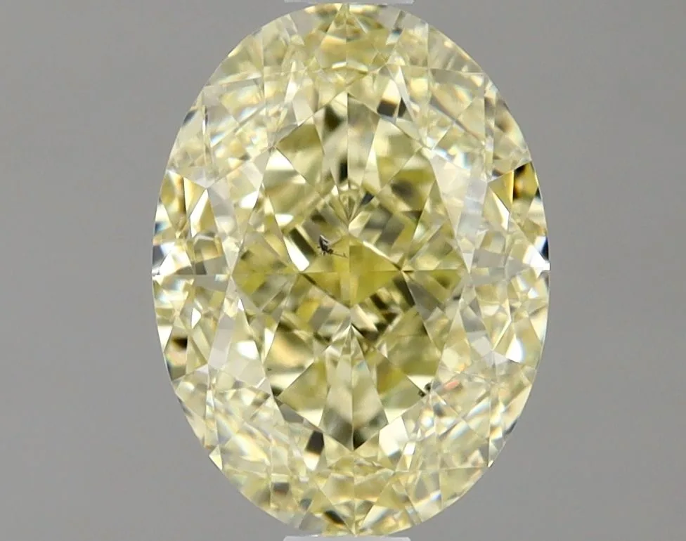 1.5 Carat Oval Fancy Light Yellow SI1 Natural Diamond 1 1.5 Carat Oval Fancy Light Yellow SI1 Natural Diamond