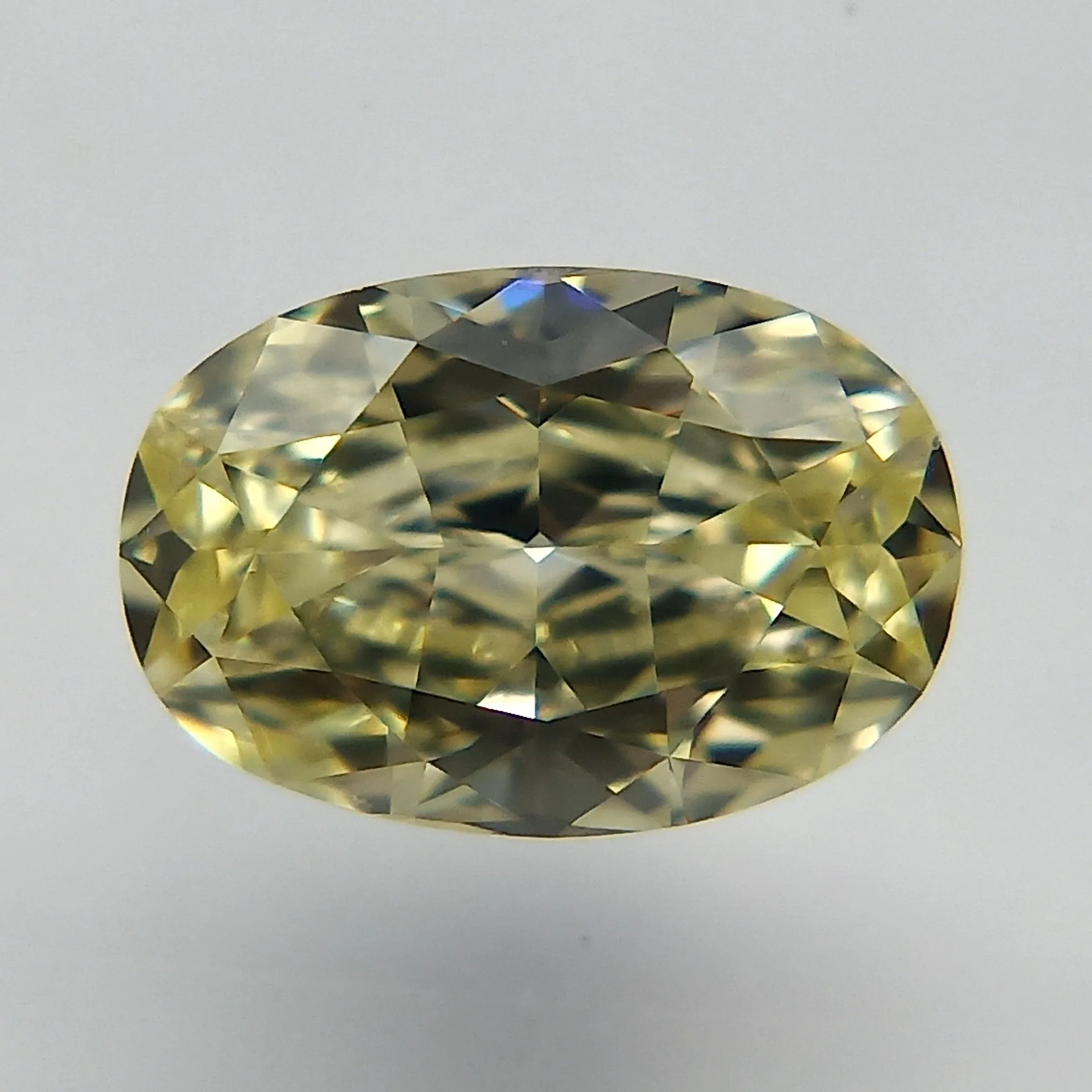 0.39 Carat Oval Fancy Yellow VS1 Natural Diamond
