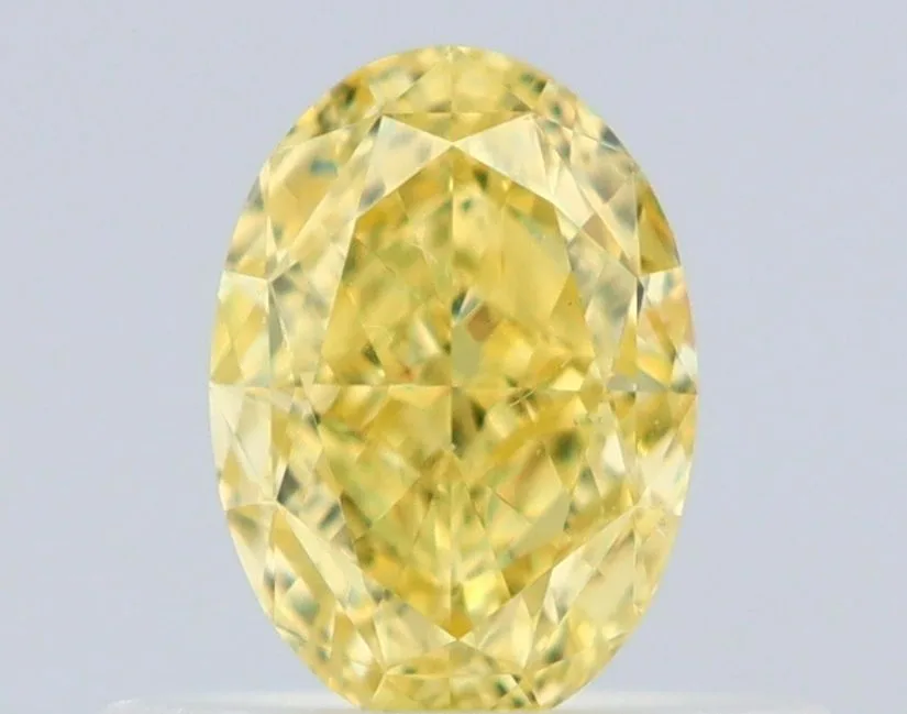 0.5 Carat Oval Fancy Intense Yellow VS2 Natural Diamond 1 0.5 Carat Oval Fancy Intense Yellow VS2 Natural Diamond
