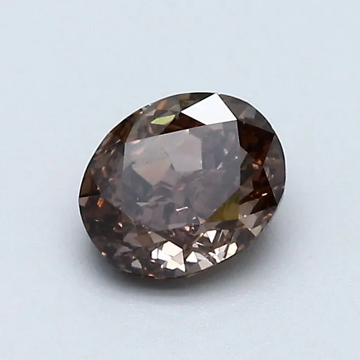 0.78 Carat Oval Fancy Dark Pink Brown SI1 Natural Diamond