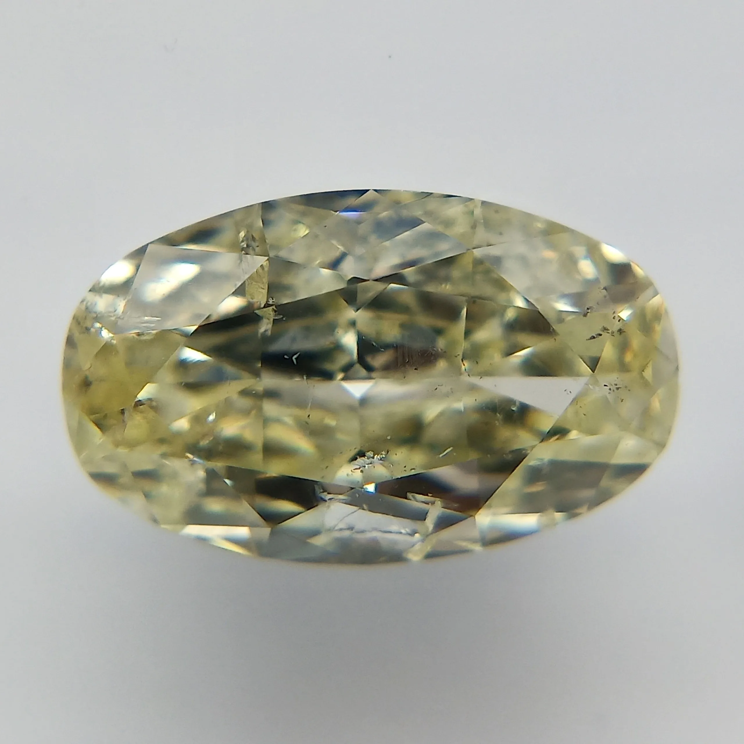 1.06 Carat Oval Fancy Light Yellow Natural Diamond