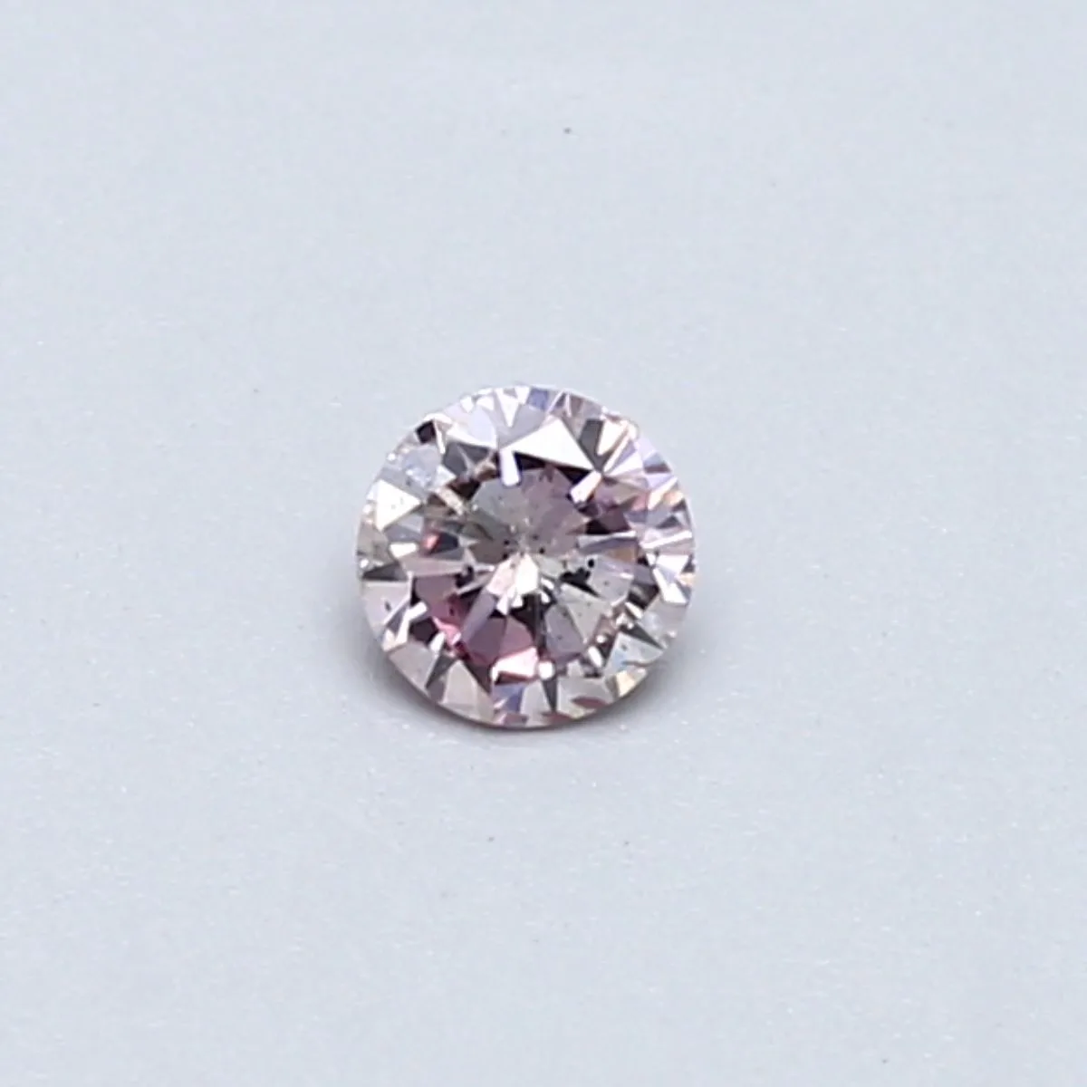 0.15 Carat Round Fancy Light Pink SI2 Natural Diamond