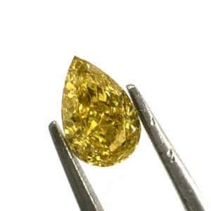 0.6 Carat Pear Fancy Vivid Yellow VVS2 Natural Diamond