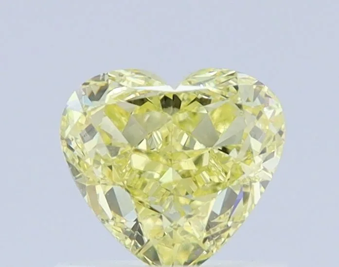 0.77 Carat Heart Fancy Yellow VS2 Natural Diamond 1 0.77 Carat Heart Fancy Yellow VS2 Natural Diamond