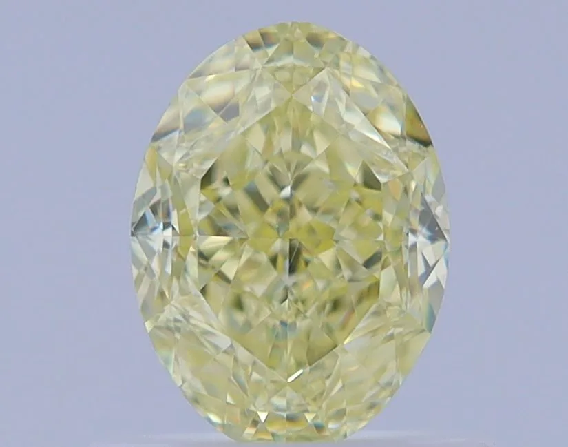 0.8 Carat Oval Fancy Yellow VS2 Natural Diamond 1 0.8 Carat Oval Fancy Yellow VS2 Natural Diamond