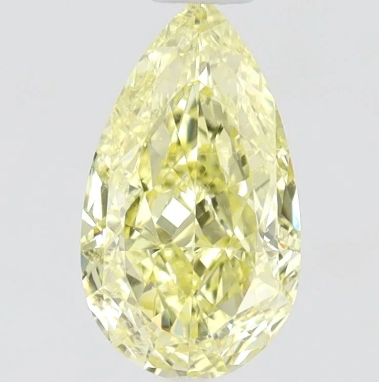 0.5 Carat Pear Fancy Yellow VS2 Natural Diamond 1 0.5 Carat Pear Fancy Yellow VS2 Natural Diamond