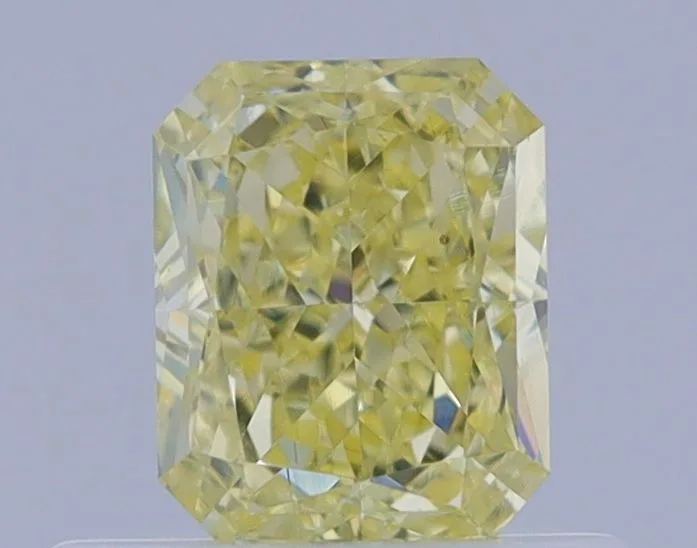 0.52 Carat Radiant Fancy Yellow VS2 Natural Diamond 1 0.52 Carat Radiant Fancy Yellow VS2 Natural Diamond