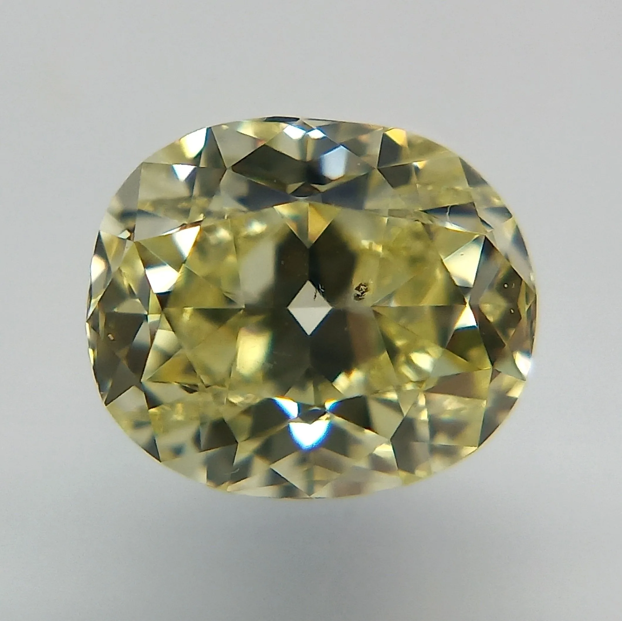 0.7 Carat Cushion Modified Fancy Yellow SI1 Natural Diamond