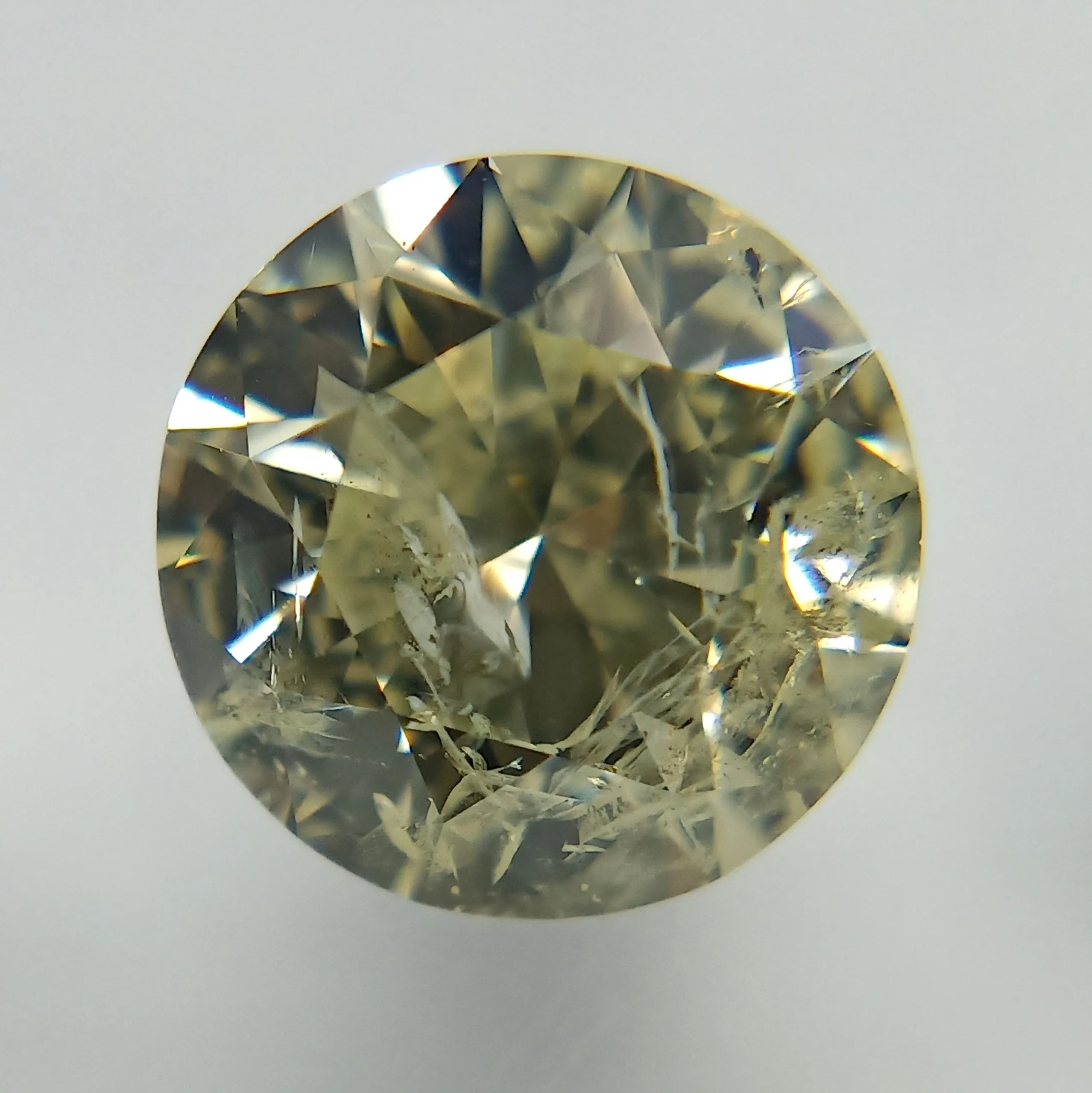 1.5 Carat Round Very Light Yellow I2 Natural Diamond 1 1.5 Carat Round Very Light Yellow I2 Natural Diamond