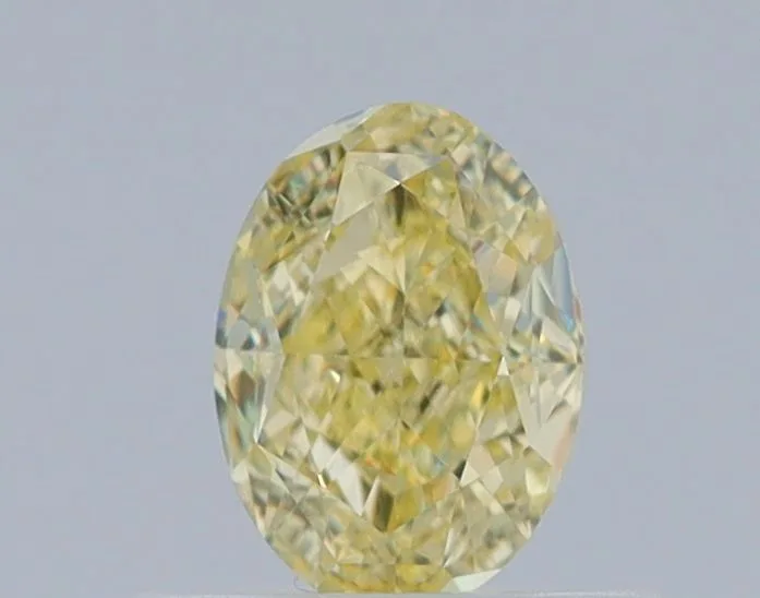 0.52 Carat Oval Fancy Yellow VVS2 Natural Diamond 1 0.52 Carat Oval Fancy Yellow VVS2 Natural Diamond